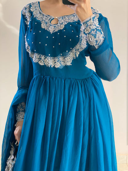 Zoya - Embroidered Chiffon Anarkali Set with Potli Bag in Teal Blue by SEHZA