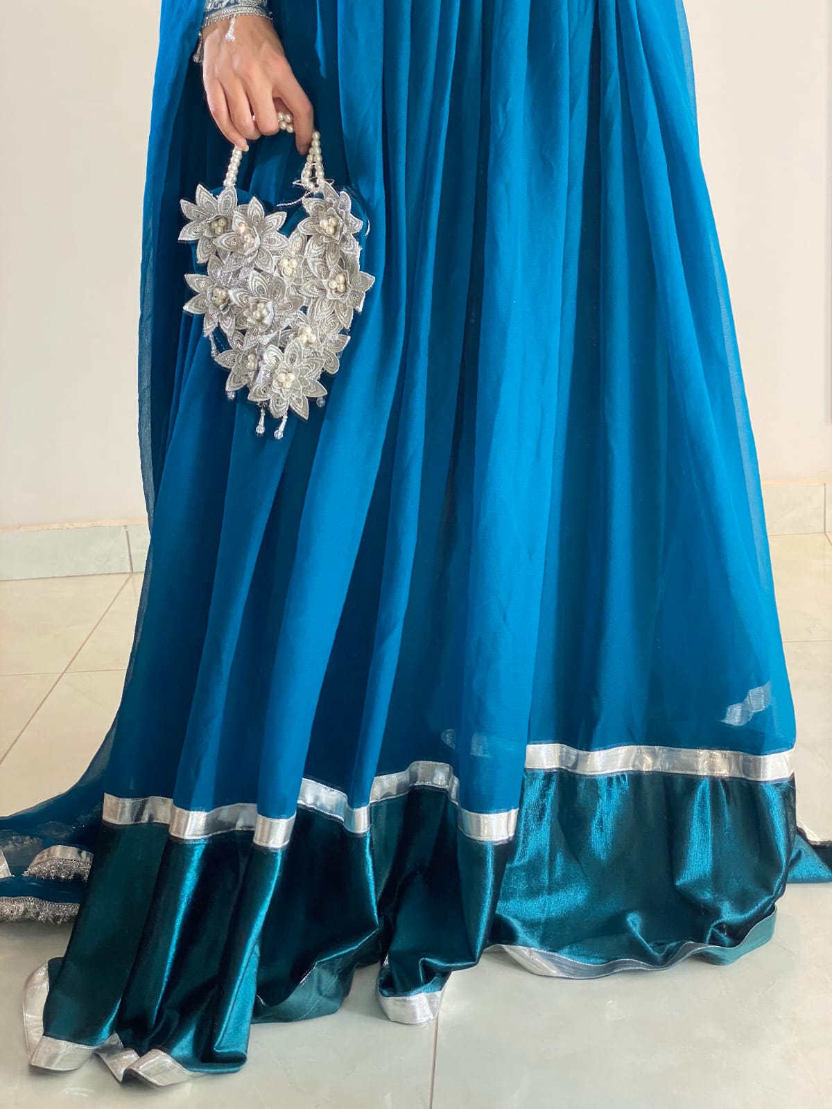 Zoya - Embroidered Chiffon Anarkali Set with Potli Bag in Teal Blue by SEHZA